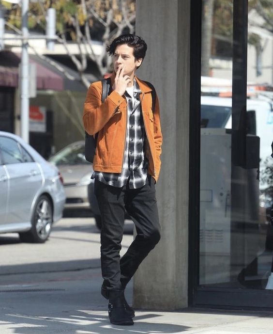 Cole Sprouse street style look with corduroy jacket