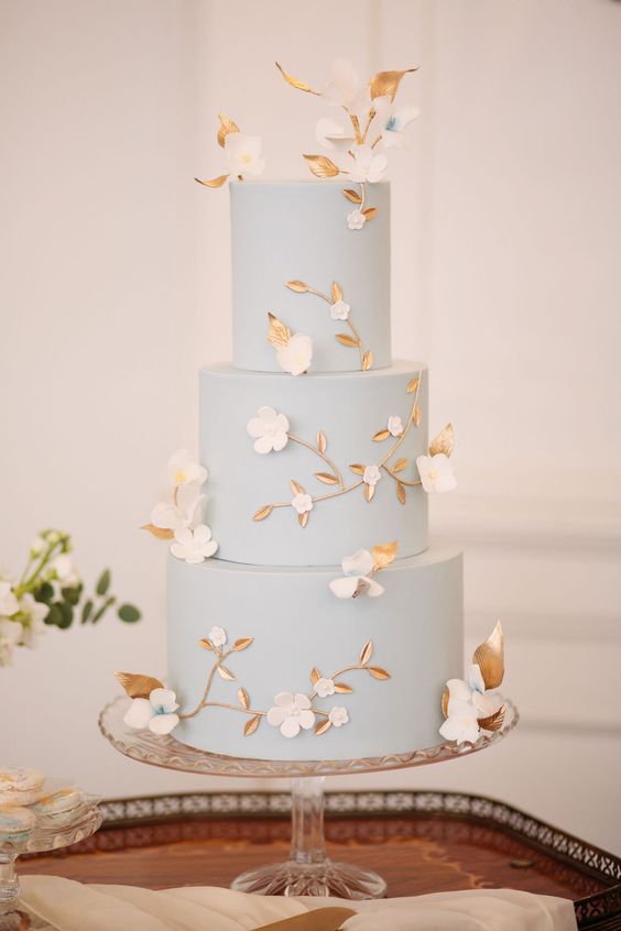 gorgeous dusty blue tropical wedding cake